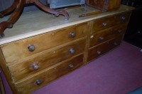 Lot 1265 - A pine sideboard fitted with six drawers,...