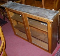 Lot 1272 - A Victorian pine double door glazed wall cabinet
