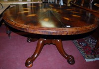 Lot 1289 - A rosewood circular pedestal breakfast table,...