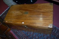 Lot 1295 - An Eastern camphor wood and brass bound hinged...