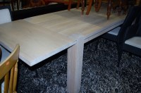 Lot 1305 - A good contemporary limed oak drawleaf dining...