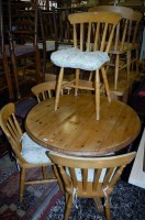 Lot 1307 - A modern pine fixed top circular breakfast...