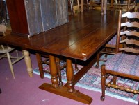 Lot 1308 - An oak five plank refectory table, raised on...
