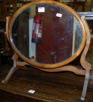 Lot 1311 - A circa 1900 mahogany oval swing toilet mirror