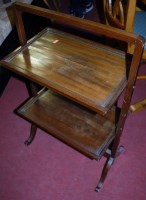 Lot 1324 - A mid-20th century oak two tier dropflap tea...