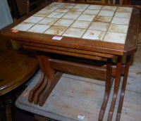 Lot 1326 - A 1960s teak and tile-top nest of three...