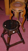 Lot 1328 - A walnut circular stool; together with a...