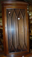 Lot 1334 - A reproduction mahogany single door glazed...