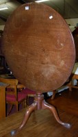 Lot 1337 - A George III mahogany circular tilt-top...