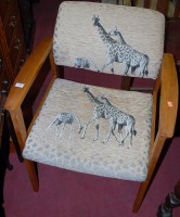 Lot 1365 - A 1970s teak framed open elbow chair, the pad...