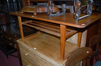 Lot 1376 - A 1960s teak low coffee table, having laddered...