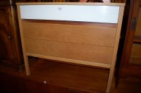 Lot 1383 - A blond oak effect and white laminate chest of...