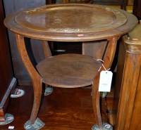 Lot 1386 - An early 20th century oak and hammered copper...