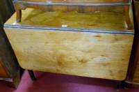 Lot 1394 - A 19th century mahogany drop leaf dining table