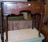 Lot 1399 - A 19th century mahogany three drawer lowboy,...