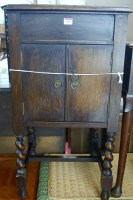 Lot 1401 - A 1930s oak hinge top freestanding gramophone...