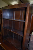Lot 1404 - A 1930s moulded oak ledgeback freestanding...