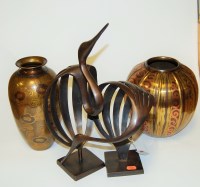 Lot 3 - A modern Indian copper and brass vase of squat...