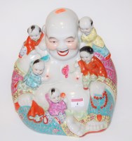 Lot 4 - A reproduction stoneware and enamelled 'Happy...