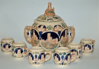 Lot 19 - An early 20th century German pottery tureen...