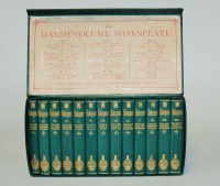 Lot 22 - An early 20th century green leather clad boxed...