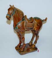 Lot 40 - A large Beswick model of a Tang horse in green...