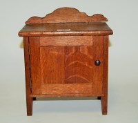 Lot 53 - An early 20th century miniature oak wash stand,...