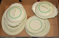 Lot 57 - A 1930s Clarice Cliff part dinner service on a...