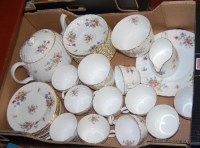 Lot 65 - A Mintons part 12 place setting tea service,...
