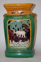 Lot 70 - A Chinese green and brown glazed pottery...