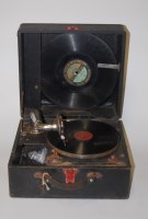 Lot 104 - A mid-20th century leather clad portable...