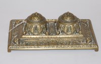 Lot 107 - A Victorian embossed brass deskstand, having...