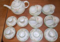 Lot 120 - A Royal Worcester six place setting tea and...