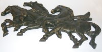 Lot 131 - A reproduction cast iron wall plaque in the...