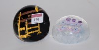 Lot 160 - A Caithness Latticino glass paperweight,...