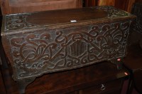 Lot 1225 - A pair of Arts & Crafts low relief carved oak...