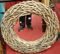 Lot 1190 - A driftwood framed circular wall mirror