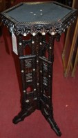 Lot 1233 - A North African low relief carved hardwood and...
