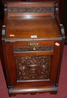 Lot 1258 - An Edwardian low relief carved walnut coal...