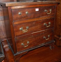 Lot 1273 - A small mahogany square front chest of three...