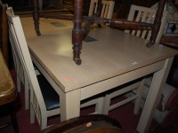 Lot 1312 - A contemporary laminate rectangular dining...
