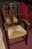 Lot 1363 - A pair of Arts & Crafts oak framed pierced...