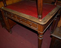 Lot 1430 - A Victorian oak and red rexine inset two...