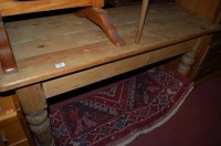 Lot 1448 - A narrow pine round cornered side table,...