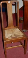 Lot 1384 - A pair of Edwardian walnut and rush seat...