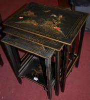 Lot 1393 - A Chinoiserie black lacquered and gilt...