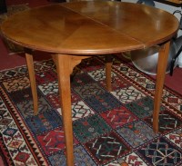 Lot 1406 - A circa 1900 French walnut demi-lune fold-over...