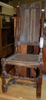 Lot 1410 - An antique joined walnut and cane inset single...