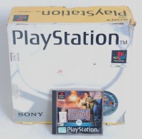 Lot 3188 - A boxed Playstation 1, and a copy of Medal of...