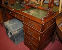 Lot 1191 - A large reproduction mahogany and gilt tooled...